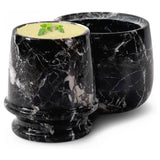 Black marble butter keeper with water seal design, lid and base shown.