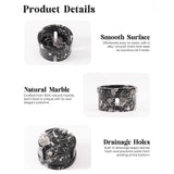 Marble berry bowls with drainage holes on a white background