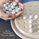 White marble balls held in hands above a textured stone surface with 'Richly Textured Marble Balls' text.