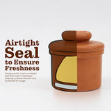 Terracotta jar with airtight lid on a white background