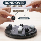 Marble game set with hands interacting, featuring text 'Bond Over Every Move' and 'Natural Marble'.