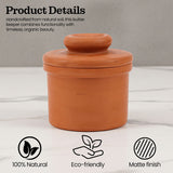 Terracotta butter keeper with lid on a white surface, featuring product details and icons.