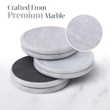 Set of marble coasters with a close-up detail on a white marble background.