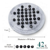 Marble game with 42 black marble balls, showing measurements on a white background.