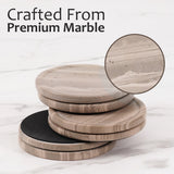 Stack of round marble coasters with a close-up detail on a marble surface, branded 'Earthen Crafts'.