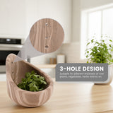 herb holder with three holes on a kitchen counter, showing a close-up of the design.