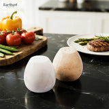 salt and pepper shakers made from natural stone