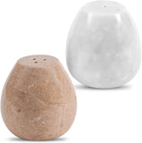 Two marble  salt and pepper shakers, one beige and one white, on a white background.