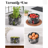 A 2x2 collage showing a black marble-patterned food and herb storage container in four use cases: planted with herbs, filled with strawberries, holding green grapes, and storing brown eggs. The top of the collage has the text 'Versatile Use'.
