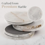 Stack of marble coasters with close-up detail on a marble surface, text 'Crafted From Premium Marble'.