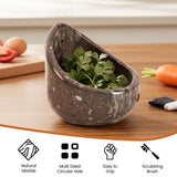 Marble herb container with fresh herbs on a wooden surface, surrounded by kitchen items.