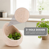 Decorative herb peeler with 3-hole design on a light surface