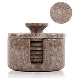 Marble-patterned container with lid and coasters on a white background
