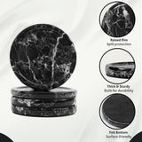 Black marble coasters with features highlighted on a white background
