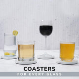 Coasters holding various glasses with drinks on a light gray surface.
