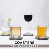 Coasters with glasses of different drinks on a light background