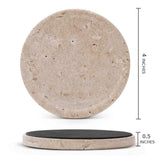 Round travertine stone coaster with black rubber bottom and measurements on a white background