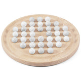 A set of 36 polished white and light gray marble or stone balls arranged on a round beige stone tray, photographed on a clean white background.