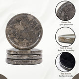 Set of stone coasters with raised rim, thick sturdy build, and felt bottom on a white background.