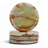 Set of onyx coasters with a marble-like pattern on a white background