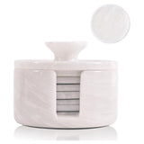 Marble-patterned ceramic container with lid on a white background