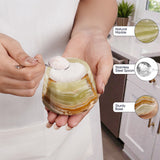 Person holding a natural marble dessert dish with a spoon, with product features highlighted.