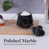 Black marble salt container with a spoon on a wooden board, text 'Polished Marble' below.