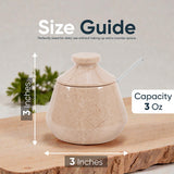 Marble-patterned container with measurements and capacity details on a wooden surface.