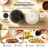 A pair of marble salt and pepper shakers. The top half shows two round marble shakers, one black and one white, with labeled dispensing holes for pepper and salt.