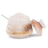 Decorative stone with a pointed top and smooth base on a white background