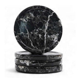 Black marble coasters with a white background