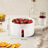 Slotted white marble lid for berry bowl colander, top view showing drainage slots